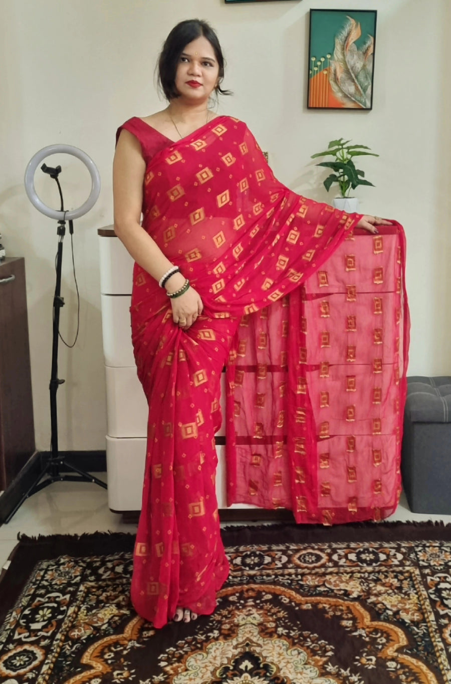 Nazmeen chiffon zari work red saree