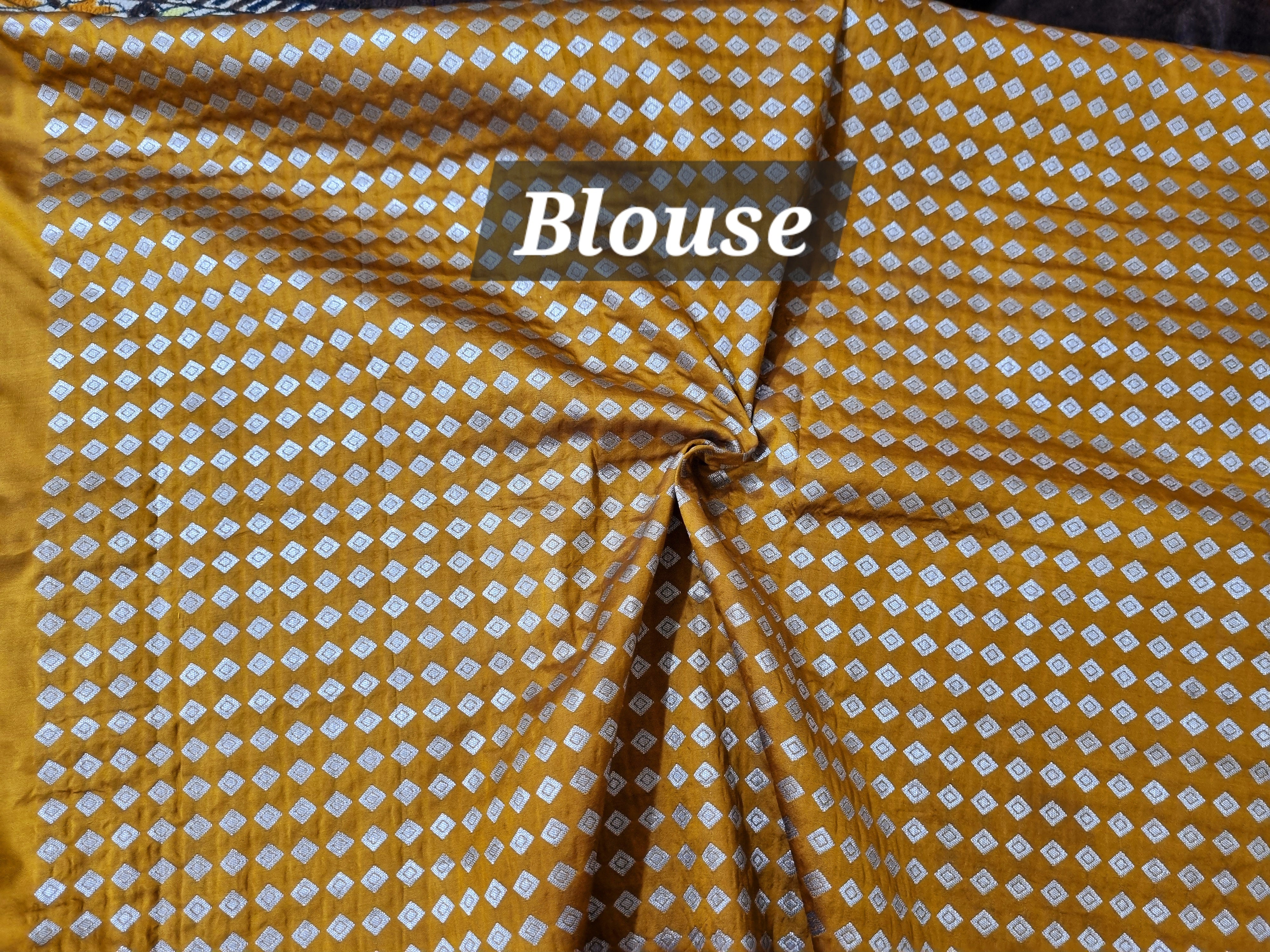 Golden brown peacock motif soft silk zari weaving saree