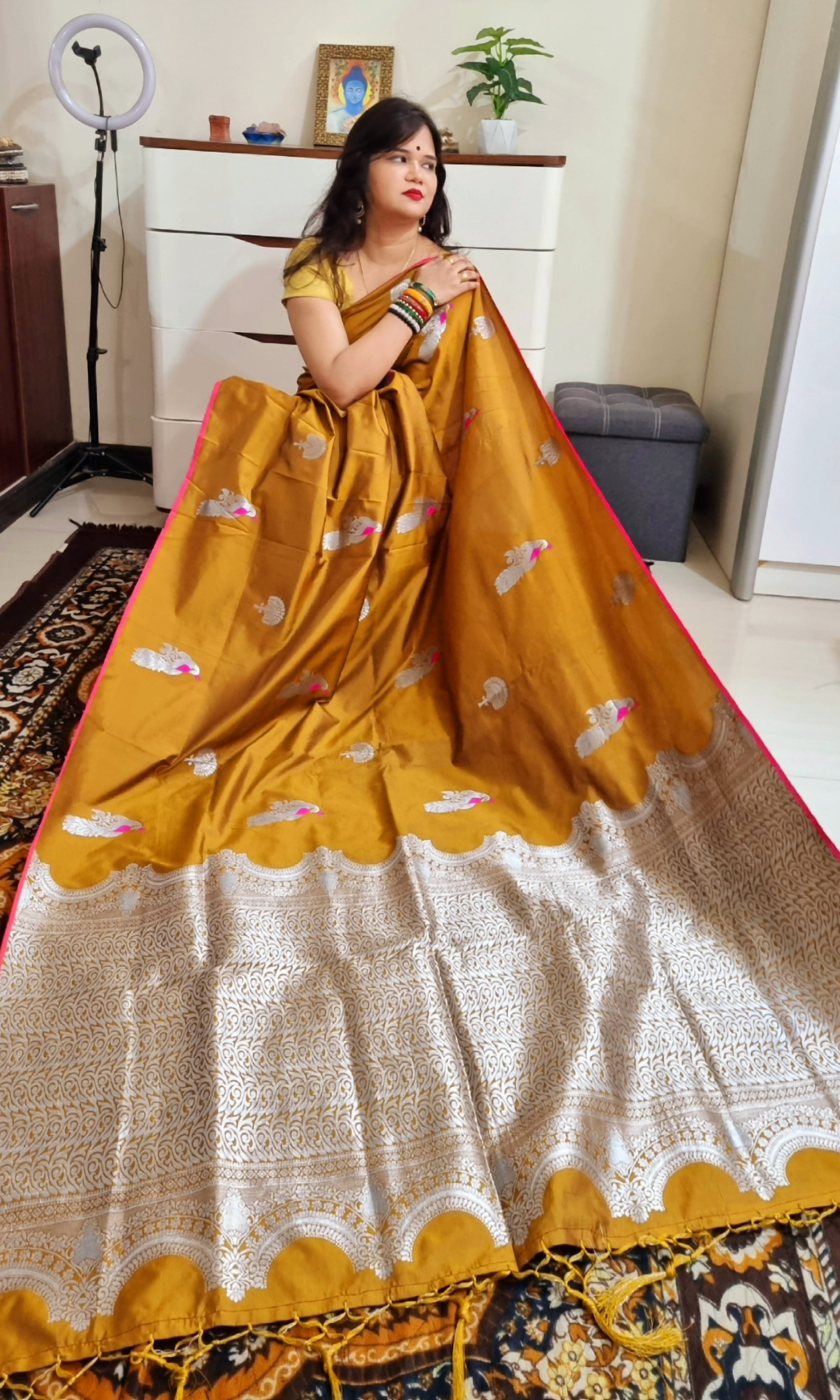 Golden brown peacock motif soft silk zari weaving saree