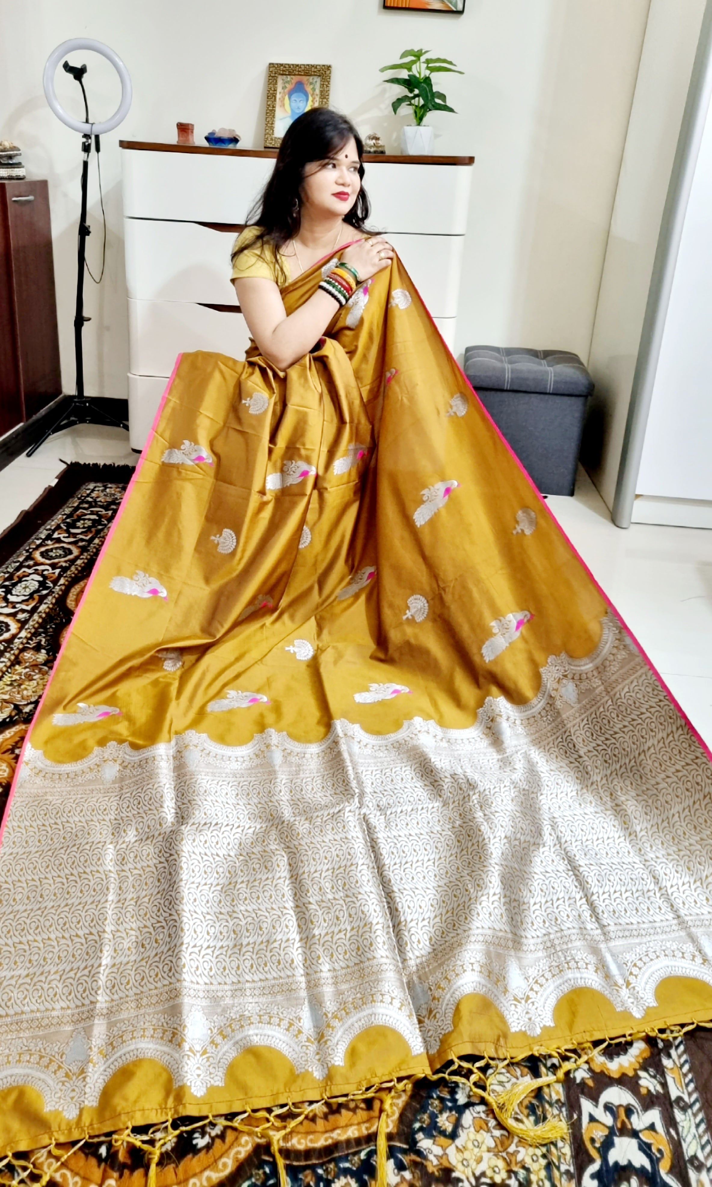 Golden brown peacock motif soft silk zari weaving saree