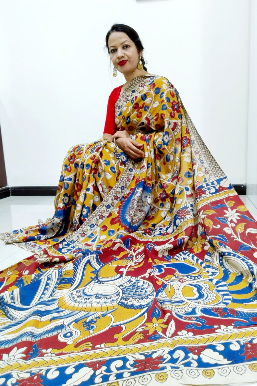 Kalamkari silk yellow and red (Machilipatnam) pedana work saree