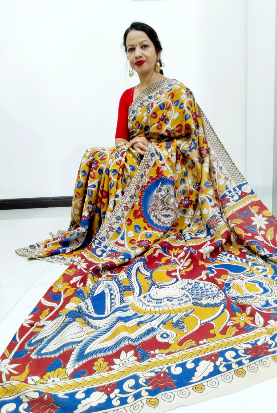 Kalamkari silk yellow and red (Machilipatnam) pedana work saree