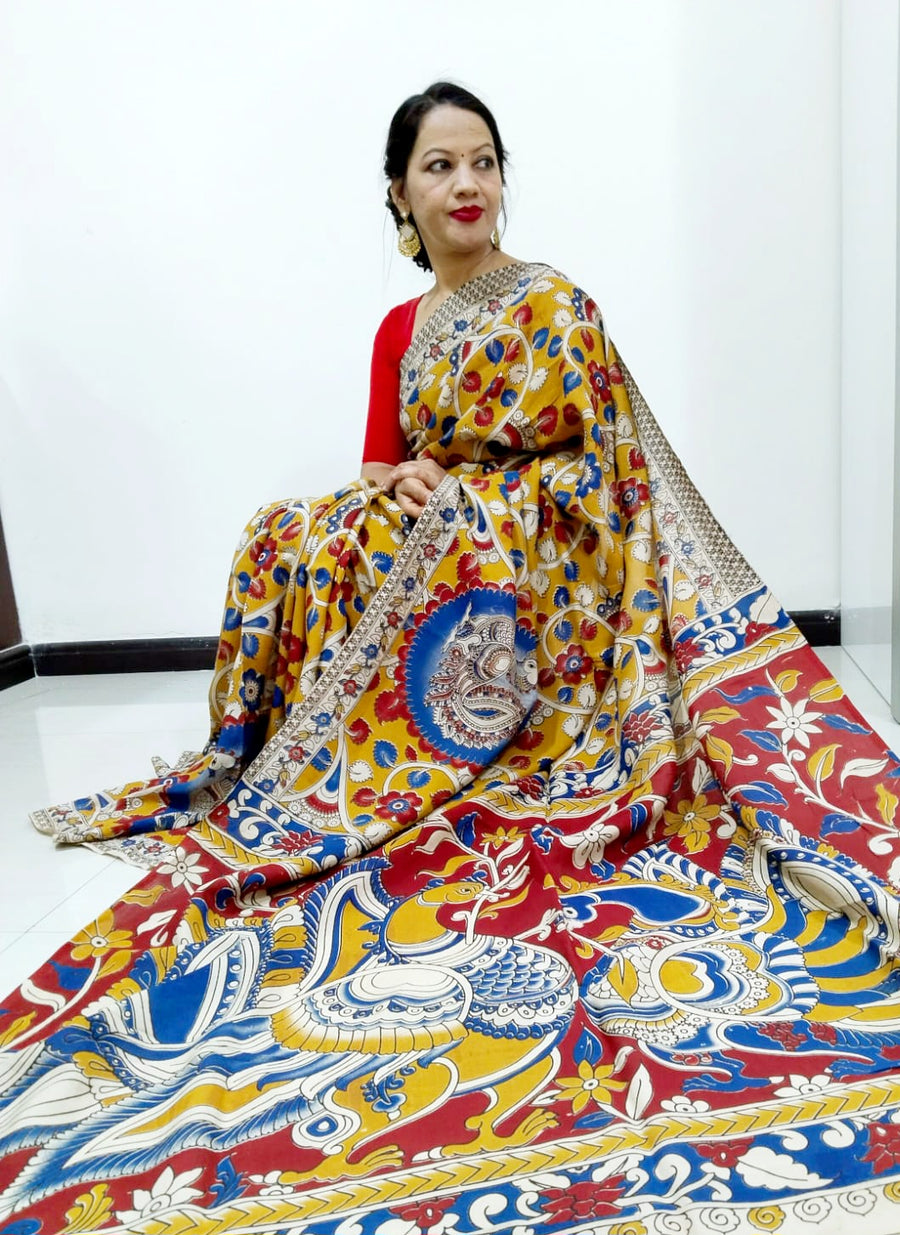 Kalamkari silk yellow and red (Machilipatnam) pedana work saree