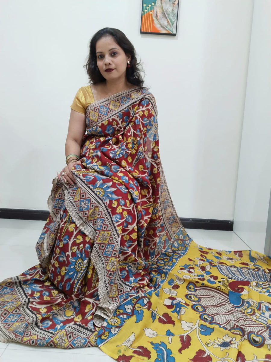 Kalamkari silk maroon and yellow  (Machilipatnam) pedana work saree